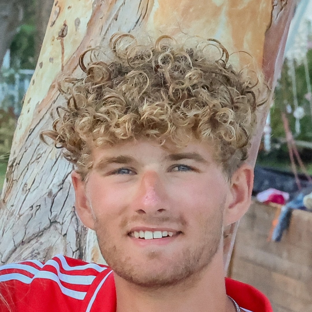 A profile photograph of Phillip Deeley